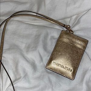 brand new gold Michael Kors lanyard